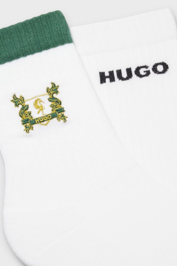 Hugo ανδρικές κάλτσες 2pack , ένα μονόχρωμο λευκό και ένα με ιδιαίτερο σχέδιο σε πράσινο χρώμα 50543173-100