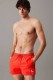 Calvin Klein ανδρικό μαγιό short σε κόκκινο χρώμα με το λογότυπο της εταιρίας στο πλάι KM0KM01100-XM8