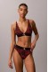 Calvin Klein bralette επενδυμένο σε κόκκινο χρώμα με animal σχέδιο και μαύρο λάστιχο στο κάτω μέρος.53%cotton,35%modal,12%elastane LV00QF8703-4OS