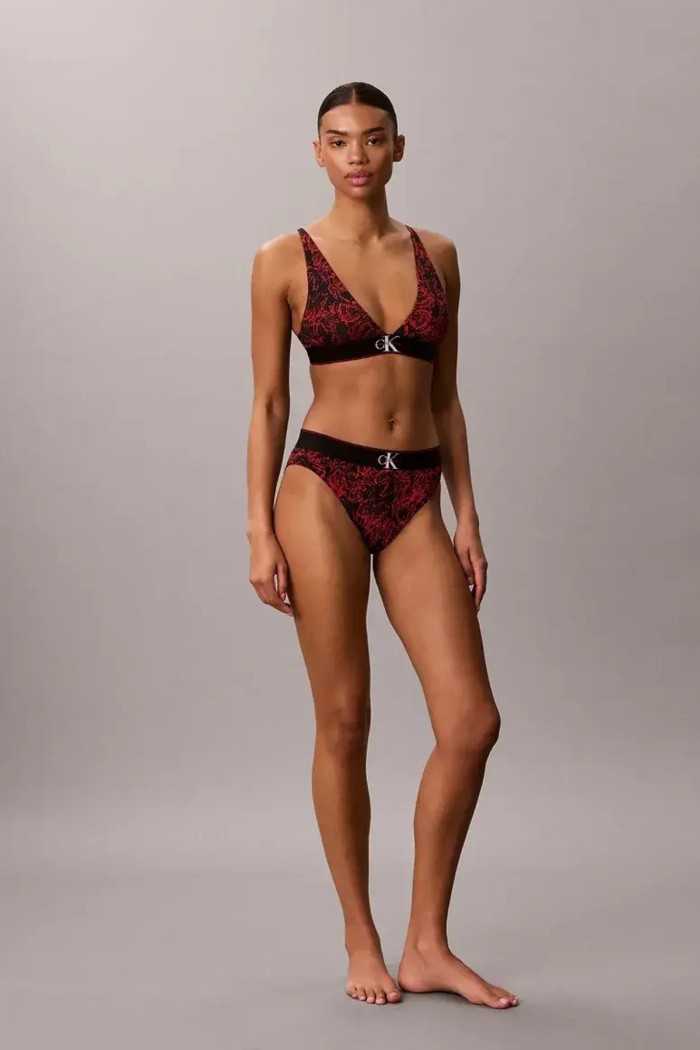 Calvin Klein bralette επενδυμένο σε κόκκινο χρώμα με animal σχέδιο και μαύρο λάστιχο στο κάτω μέρος.53%cotton,35%modal,12%elastane LV00QF8703-4OS