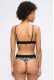 Calvin Klein γυναικείο κυλοτάκι string σε ασπρόμαυρο χρώμα με μαύρο λάστιχο και το λογότυπο της εταιρίας LV00QF8813-Y3D