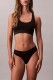 Calvin Klein γυναικείο κυλοτάκι string σε μαύρο χρώμα με μαύρο γυαλιστερό λάστιχοLV00QF8826-UB1
