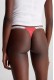 Calvin Klein κυλοτάκι string σε κοραλί χρώμα με λευκό λάστιχο στο πλάι QD5157E-XKP